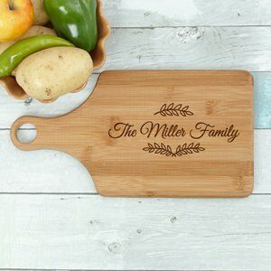 Engraved Family Name Paddle Cutting Board