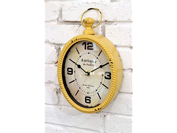 Oval-shaped Yellow Wall Clock